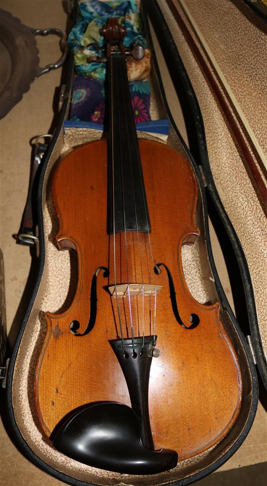 A three quarter size violin, cased